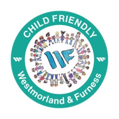 A ring of children surround the W&F logo
